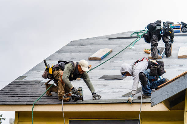 Professional Roofing technician working in Park City, UT